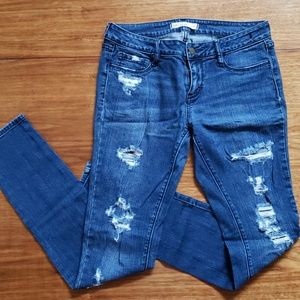 Blue distressed jeans